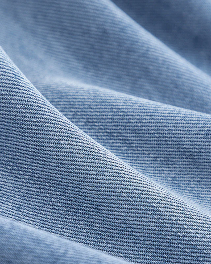 Marites - Denim- und Kamelmantel.