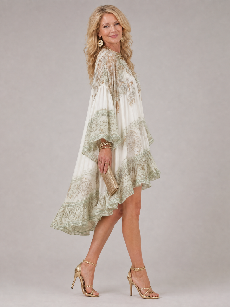 Okela | Kleid mit Blumendruck, Ballonärmeln & Rüschenabschluss