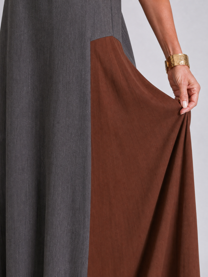 Zorynthia | Ärmelloses Midi-Kleid im Colorblock-Design mit hohem Ausschnitt & Cutout