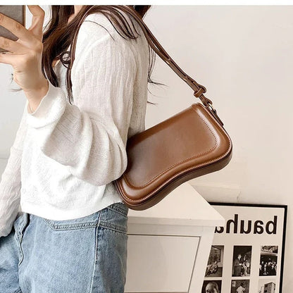 Amal - Handtasche mit gewellter Klappe