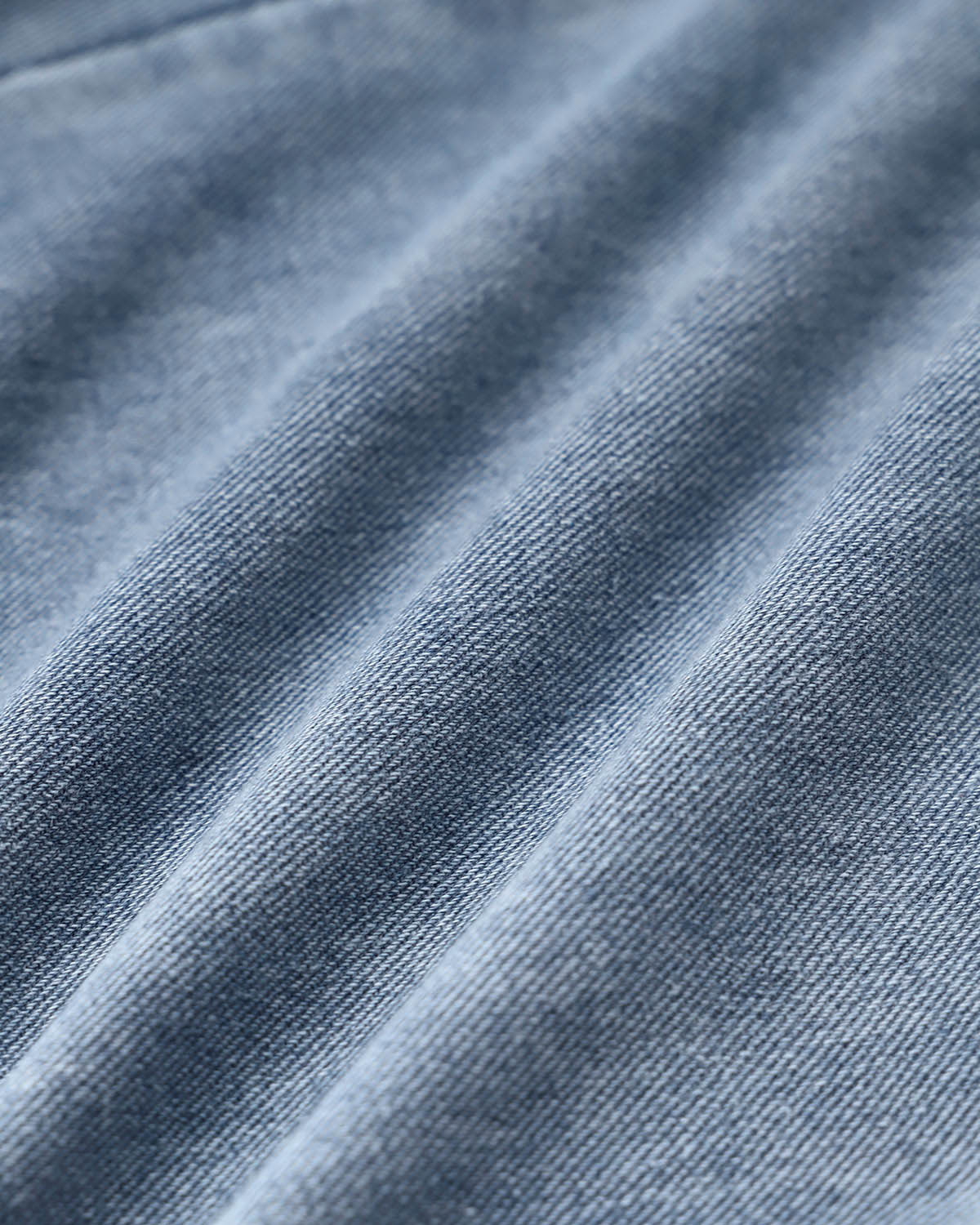 Blaue Schlaghose mit Knopfleiste